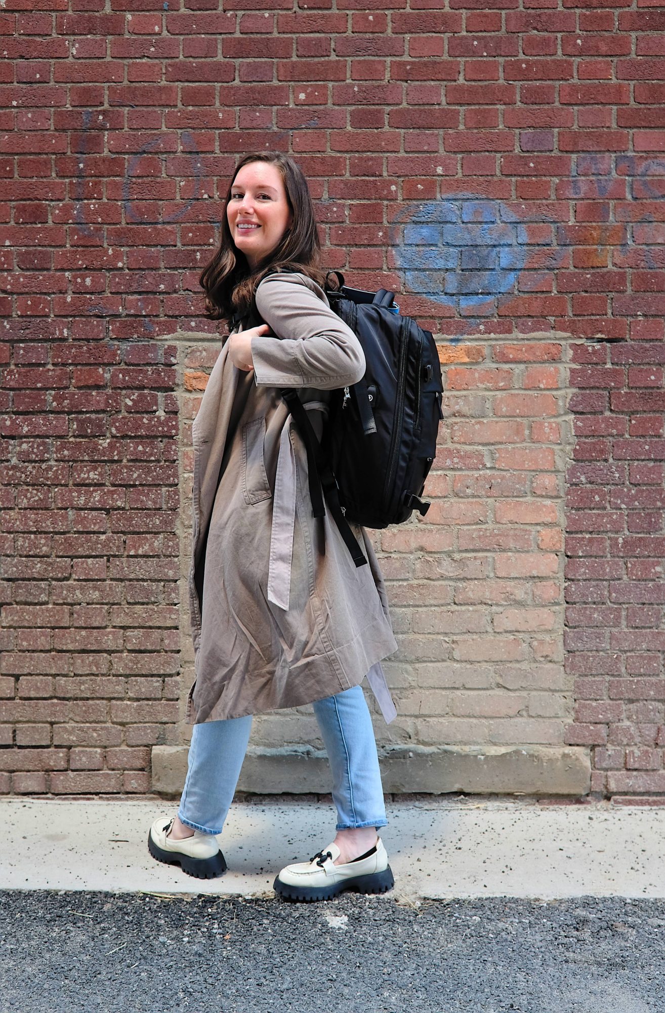 Alyssa carries a Frontier-approved backpack