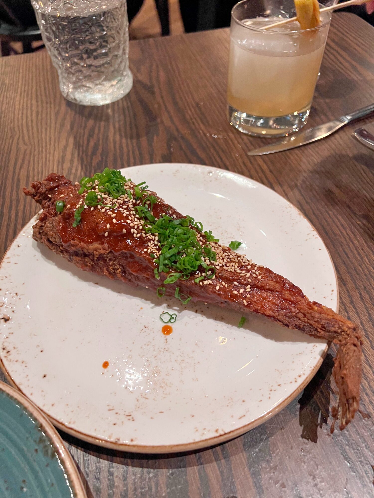 a large piece of fried monkfish