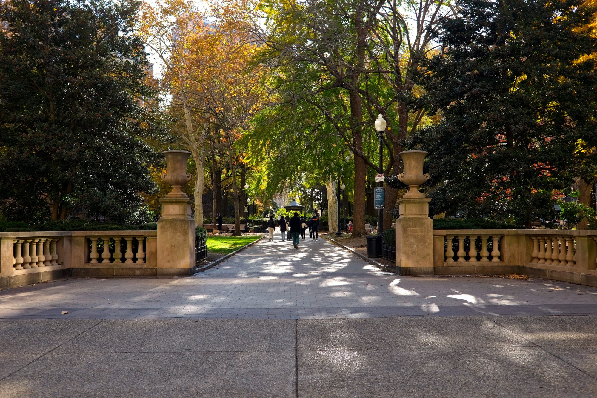 People walk through Rittenhouse Square