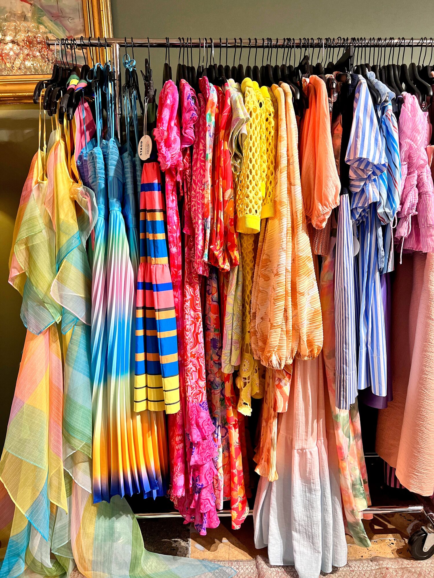 A rack of colorful dresses at Thirty-One Jane