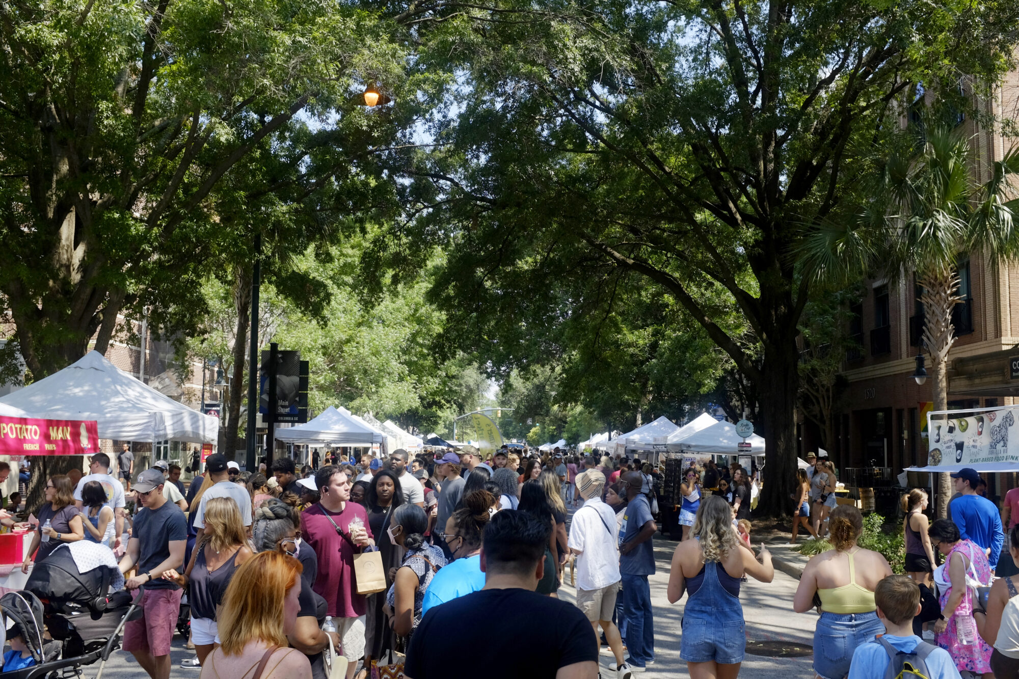 A crowd at the Soda City Market