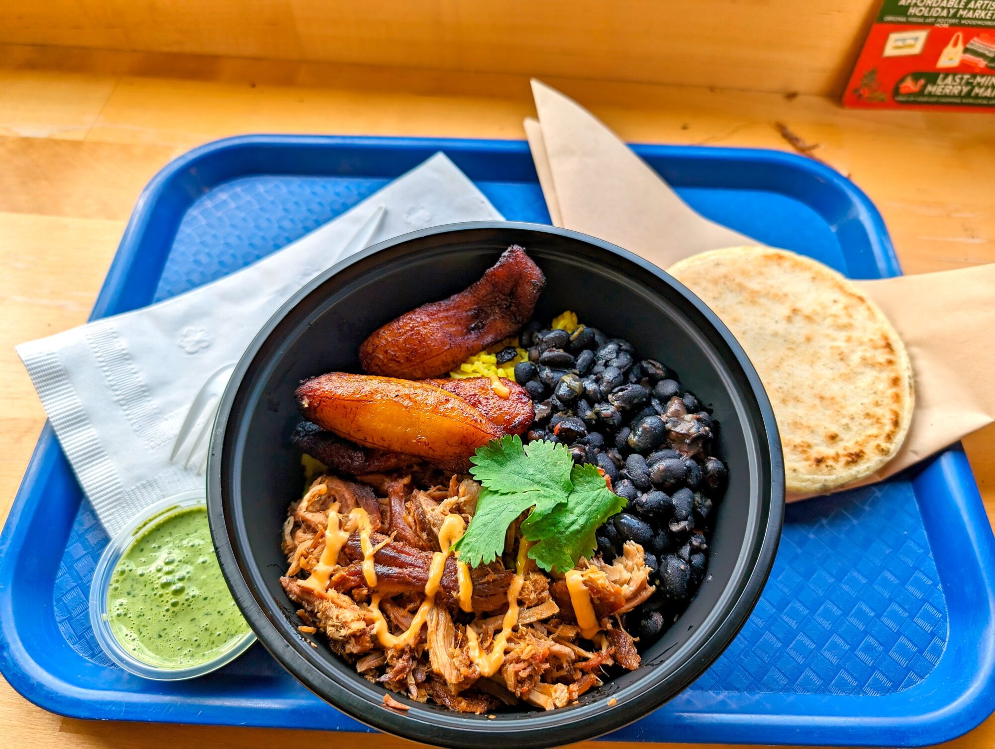 A rice bowl with pork and beans