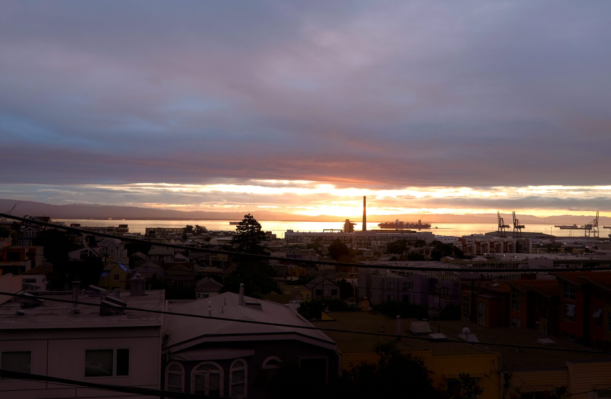 The sun rises over San Francisco