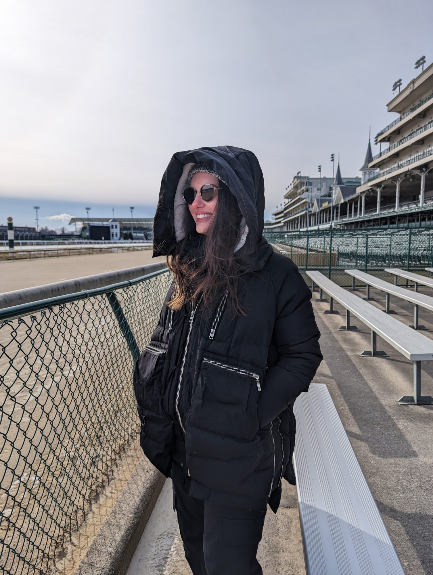 Alyssa is bundled up on the Kentucky Derby track