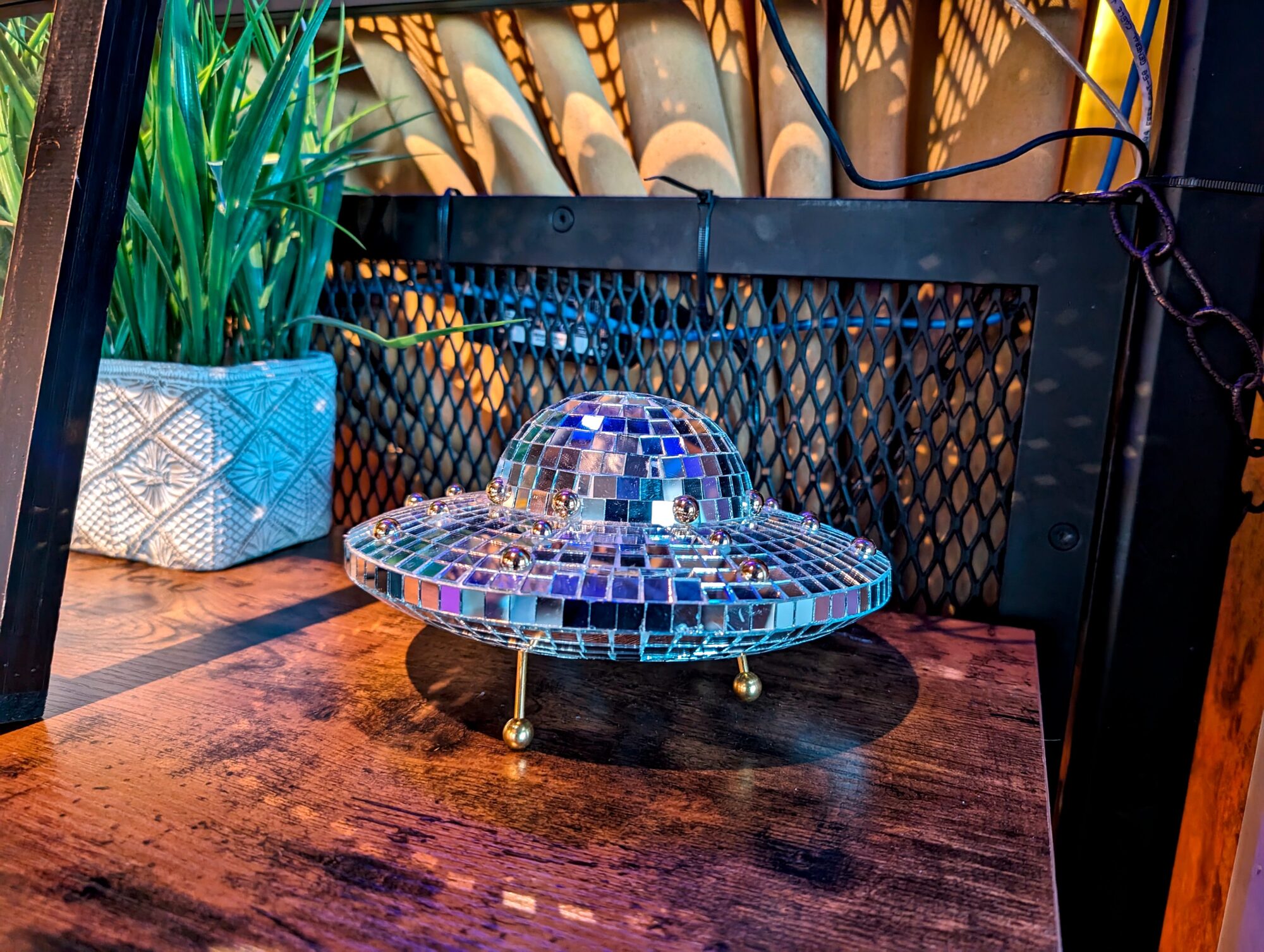 A disco ball shaped like Saturn