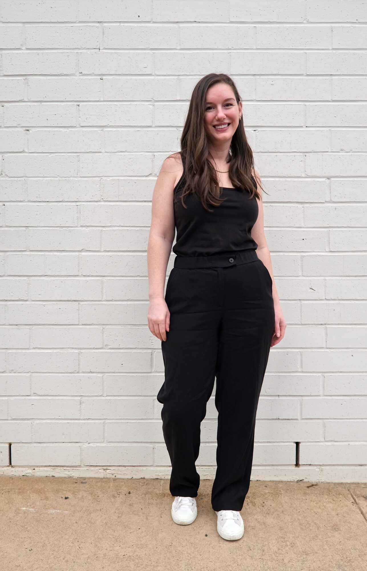 Alyssa wears the All Day Cigarette Pants with a black tank
