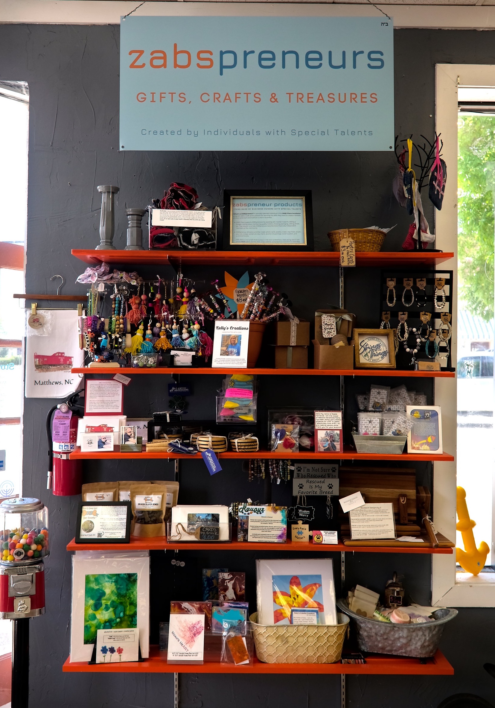 A sign above a display of handmade items reads "zabspreneurs"