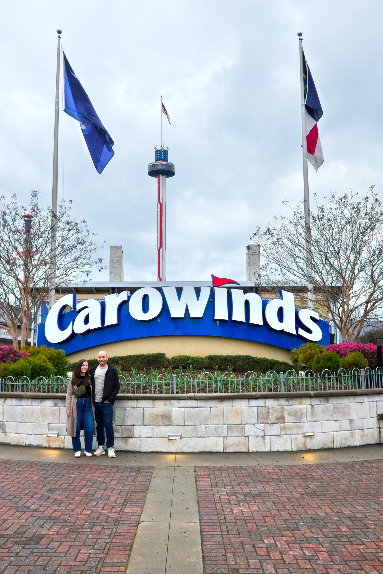 Alyssa and Michael in front of the sign at Carowinds