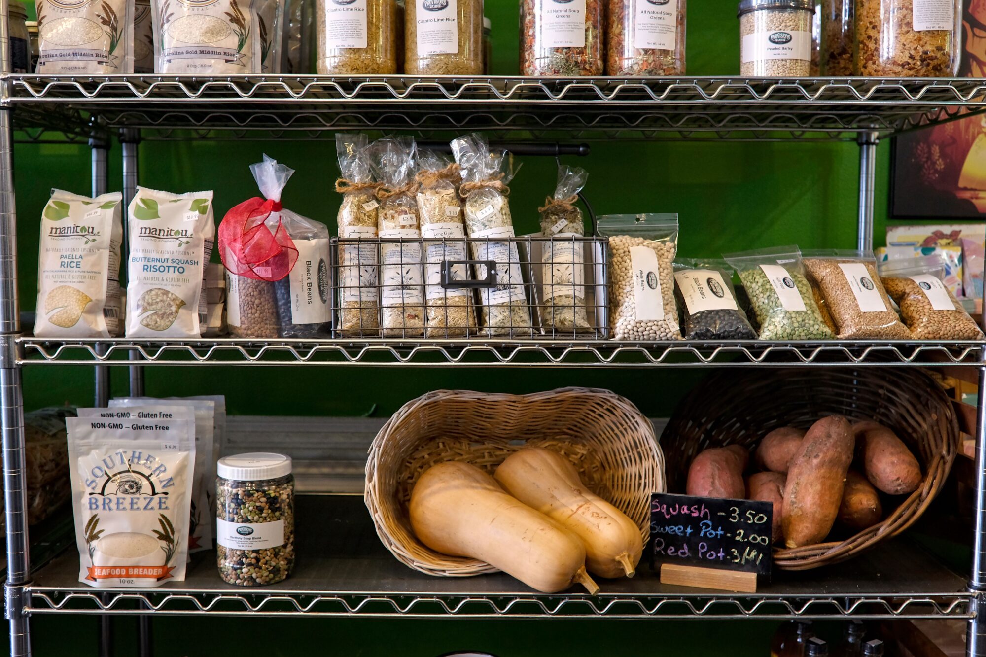 A shelf of produce and grains for sale at Provisions on Main