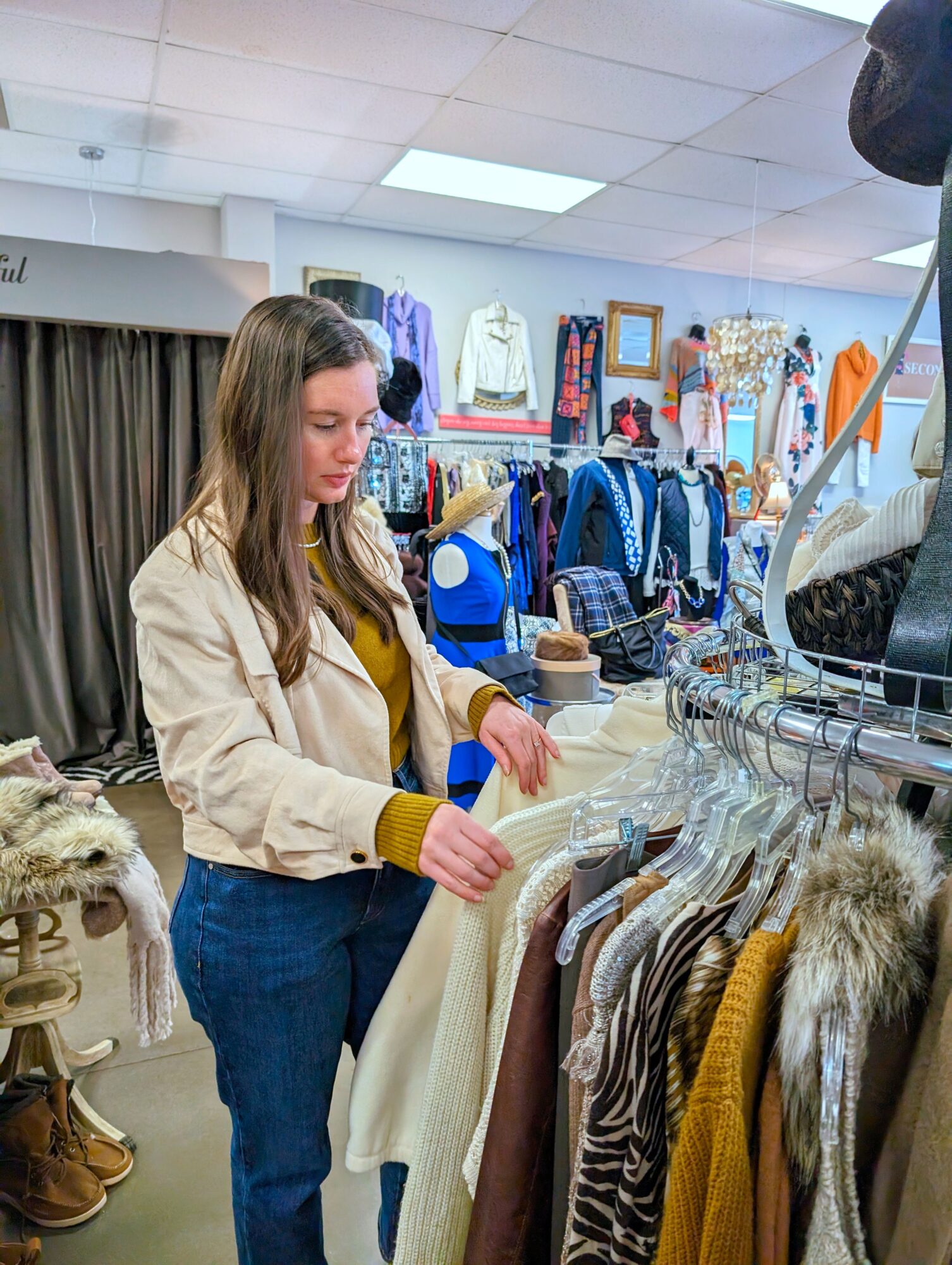 Alyssa shops at a thrift store in Waxhaw