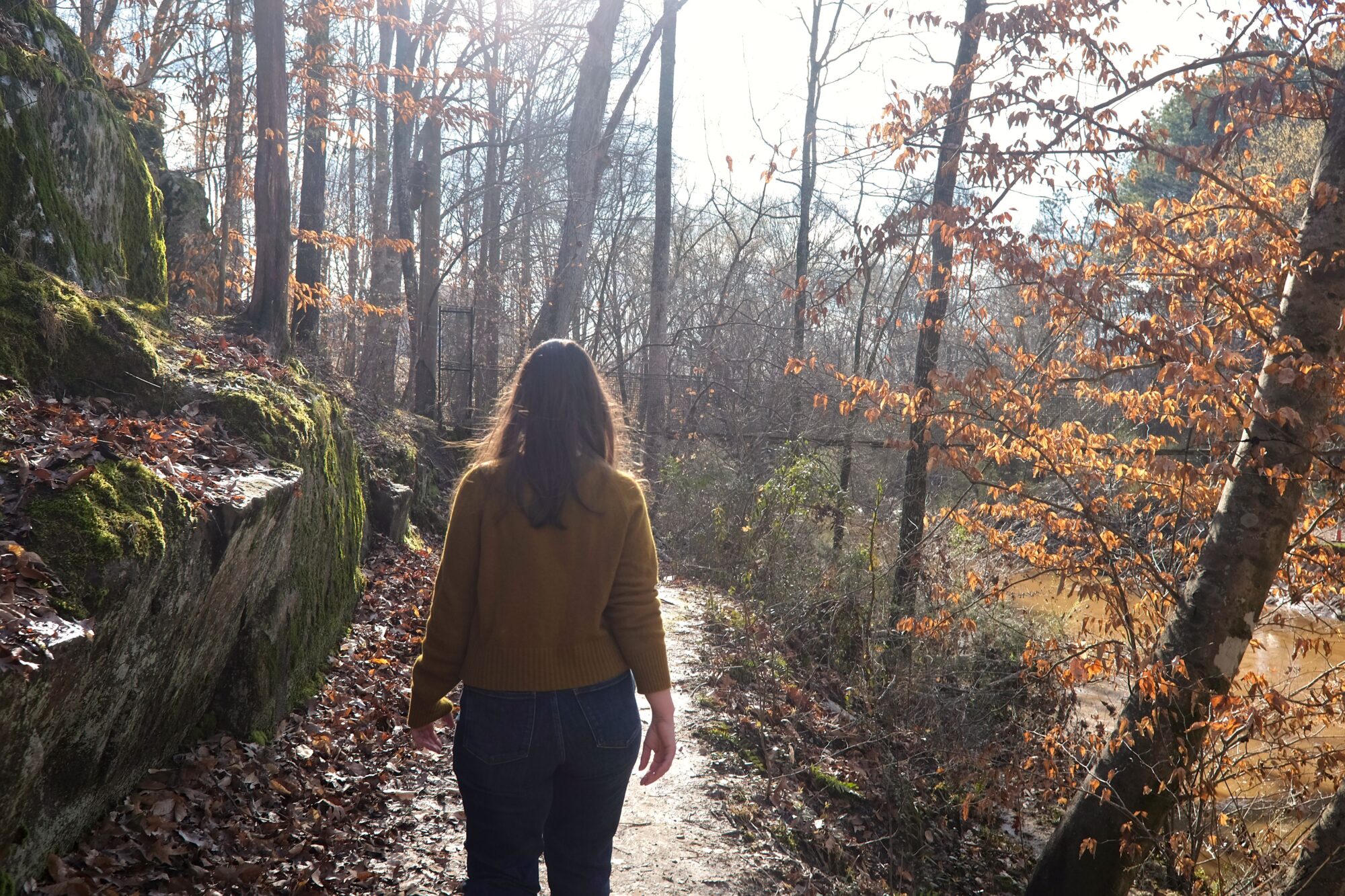 Alyssa walks down a trail in Waxhaw