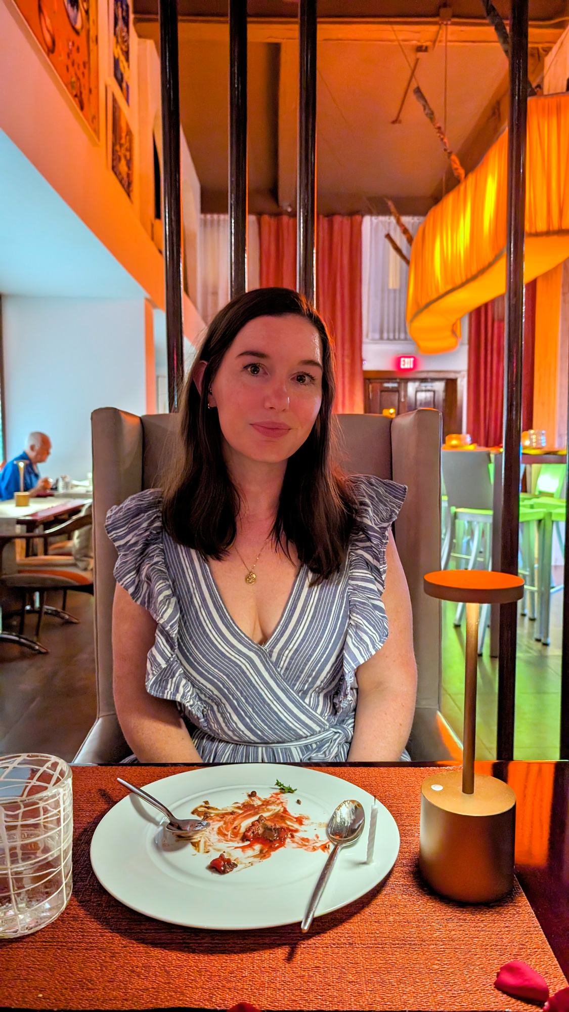 Alyssa sits with an empty plate at Marmalade