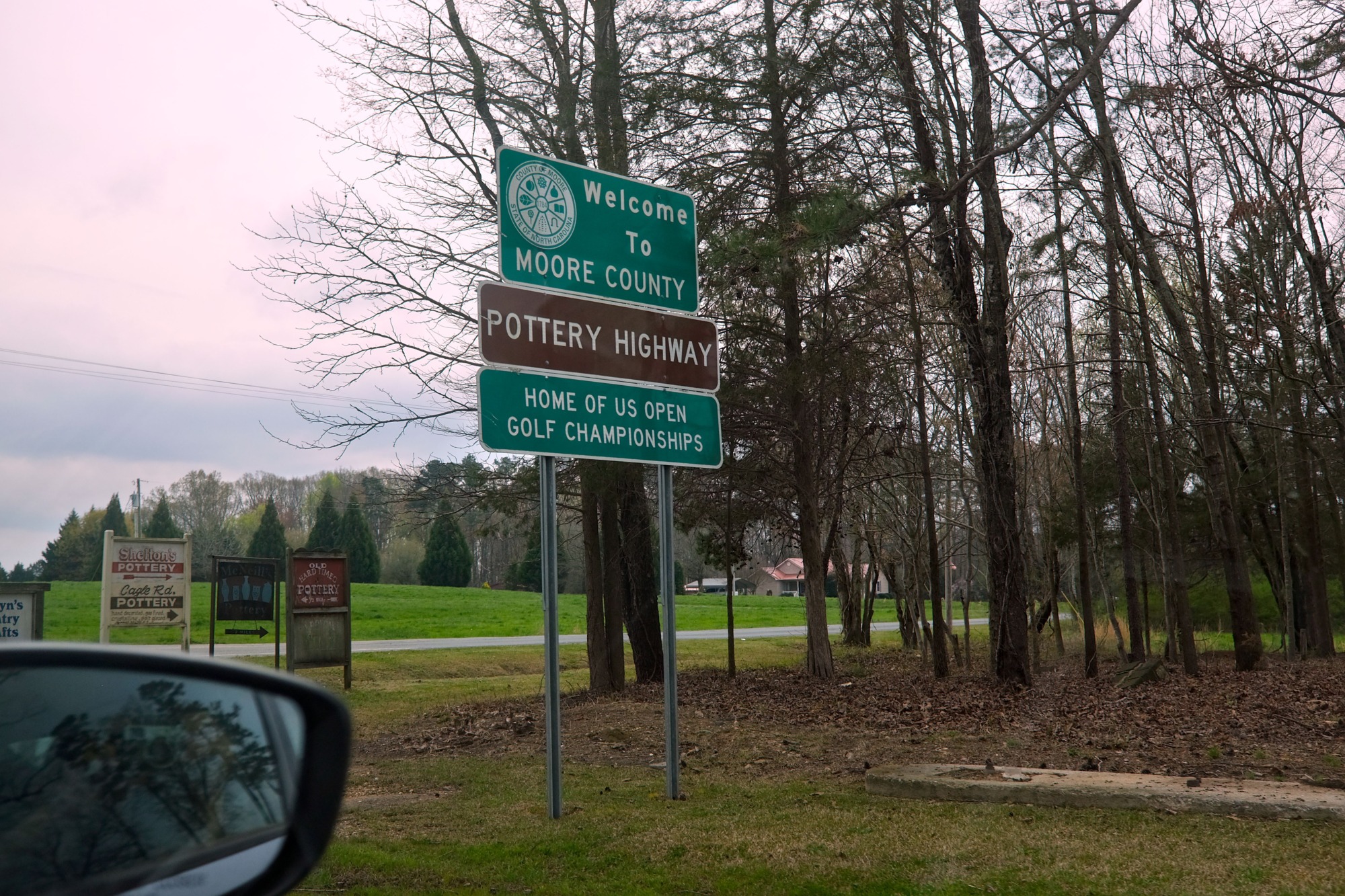 A road sign declaring drivers are on the Pottery Highway