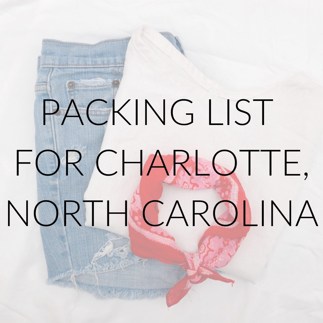 A tee and jeans with text overlay that reads "packing list for Charlotte, North Carolina"