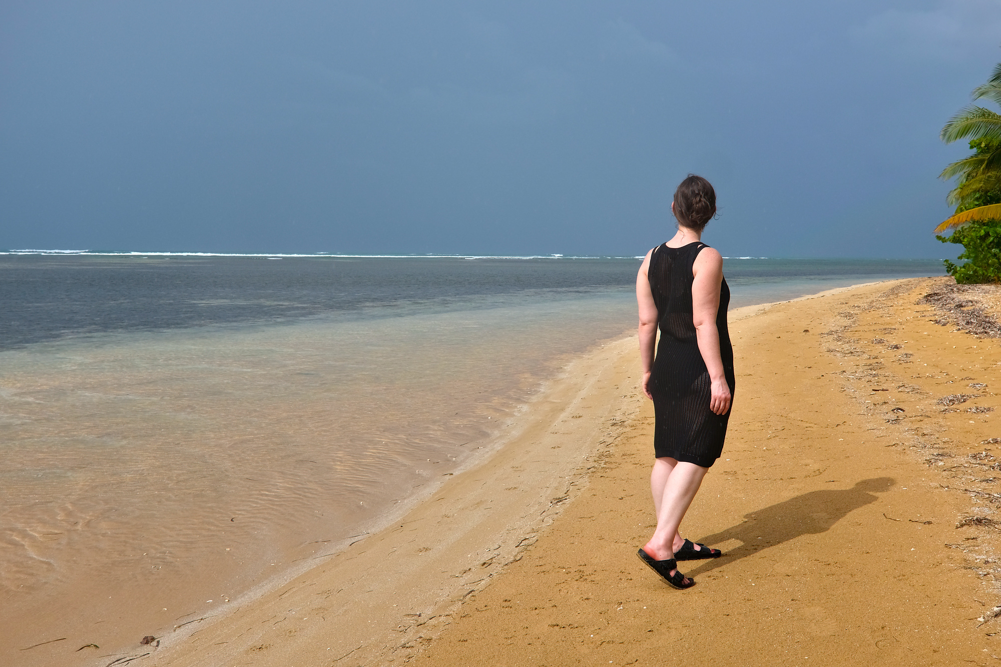 Alyssa looks out at a beach in PR