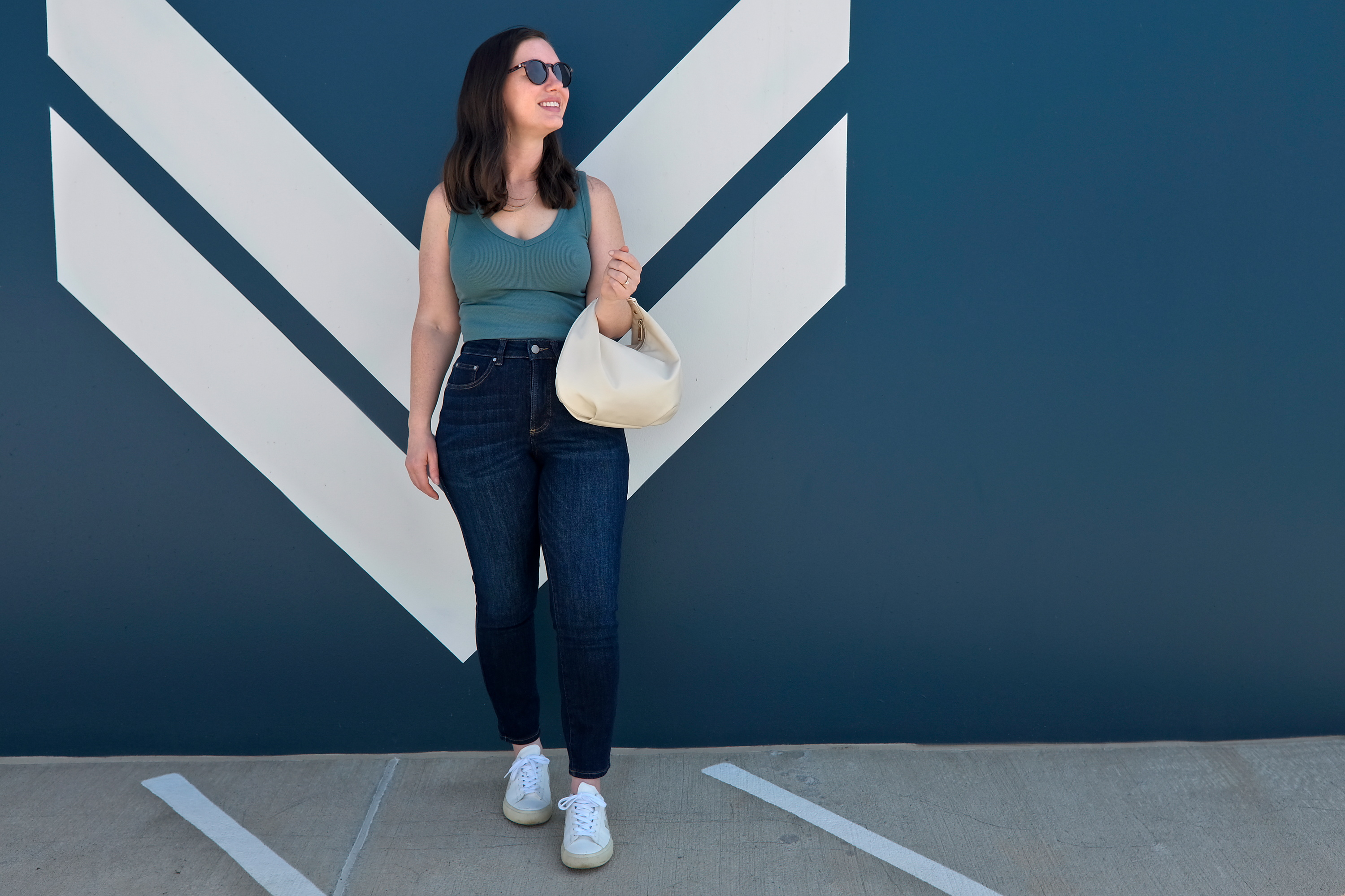 Alyssa carries the Aoyama Bag as a handbag