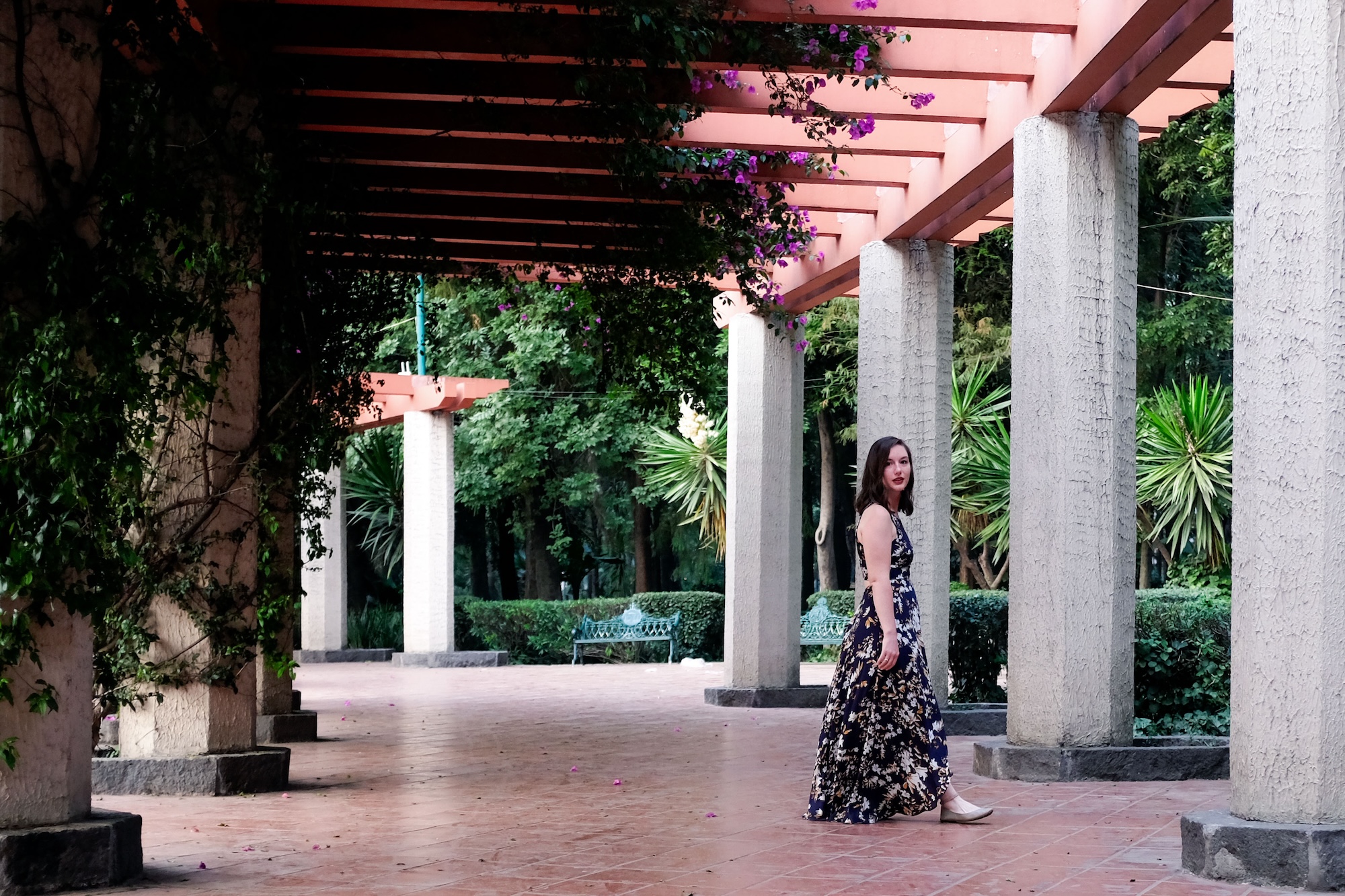 Alyssa wears a floral dress and walks in Mexico City