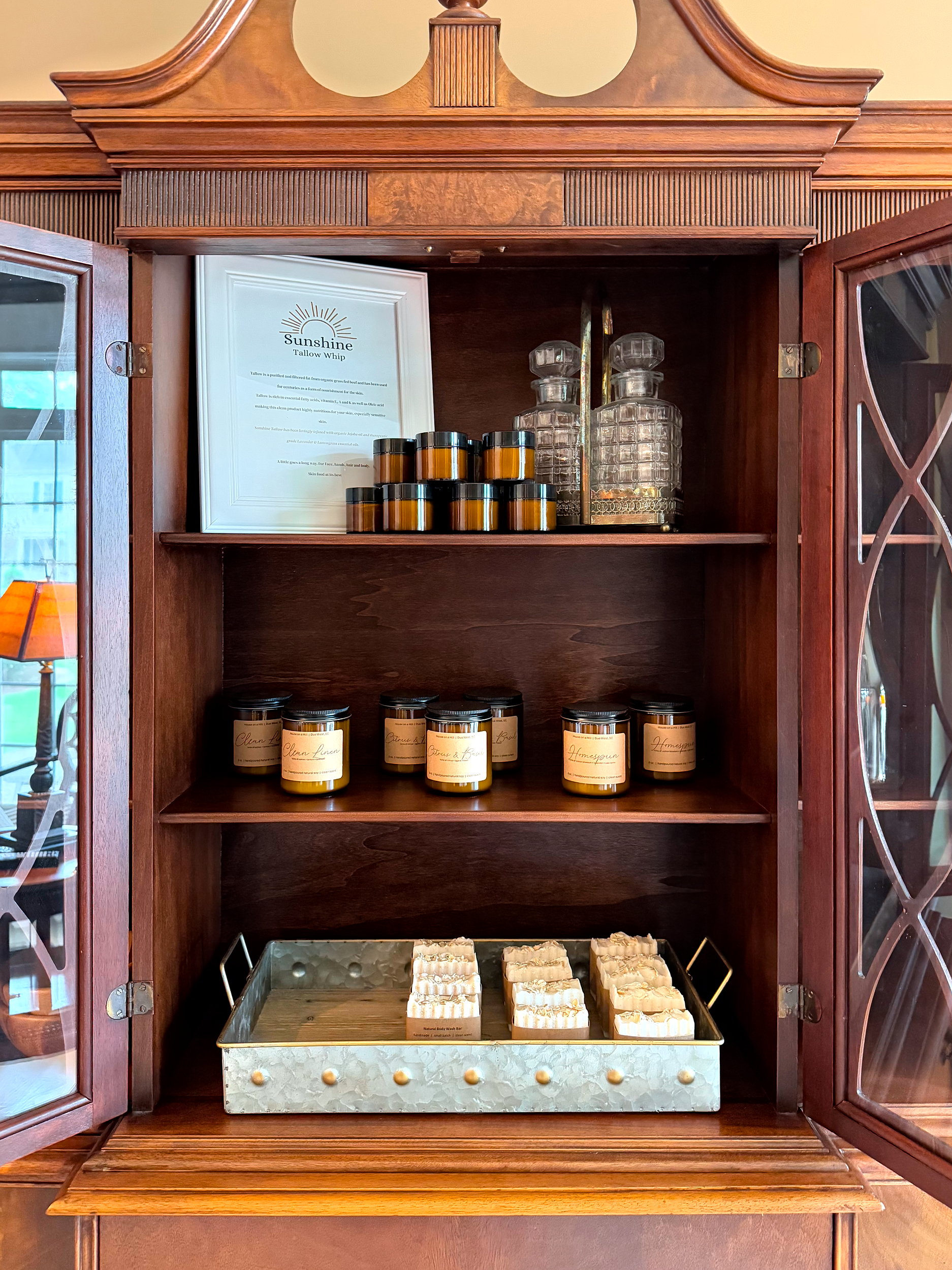 Shelves loaded with local soaps, lotions, and candles