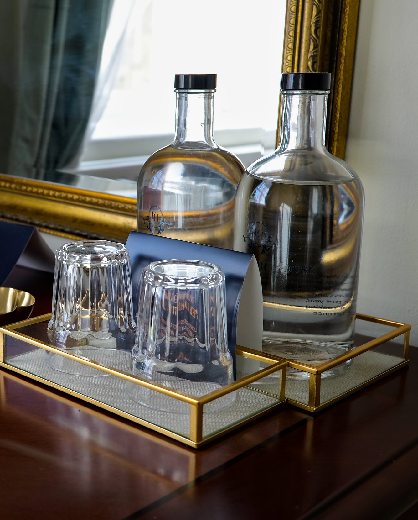 Two bottles of water in the room at Ennismore House