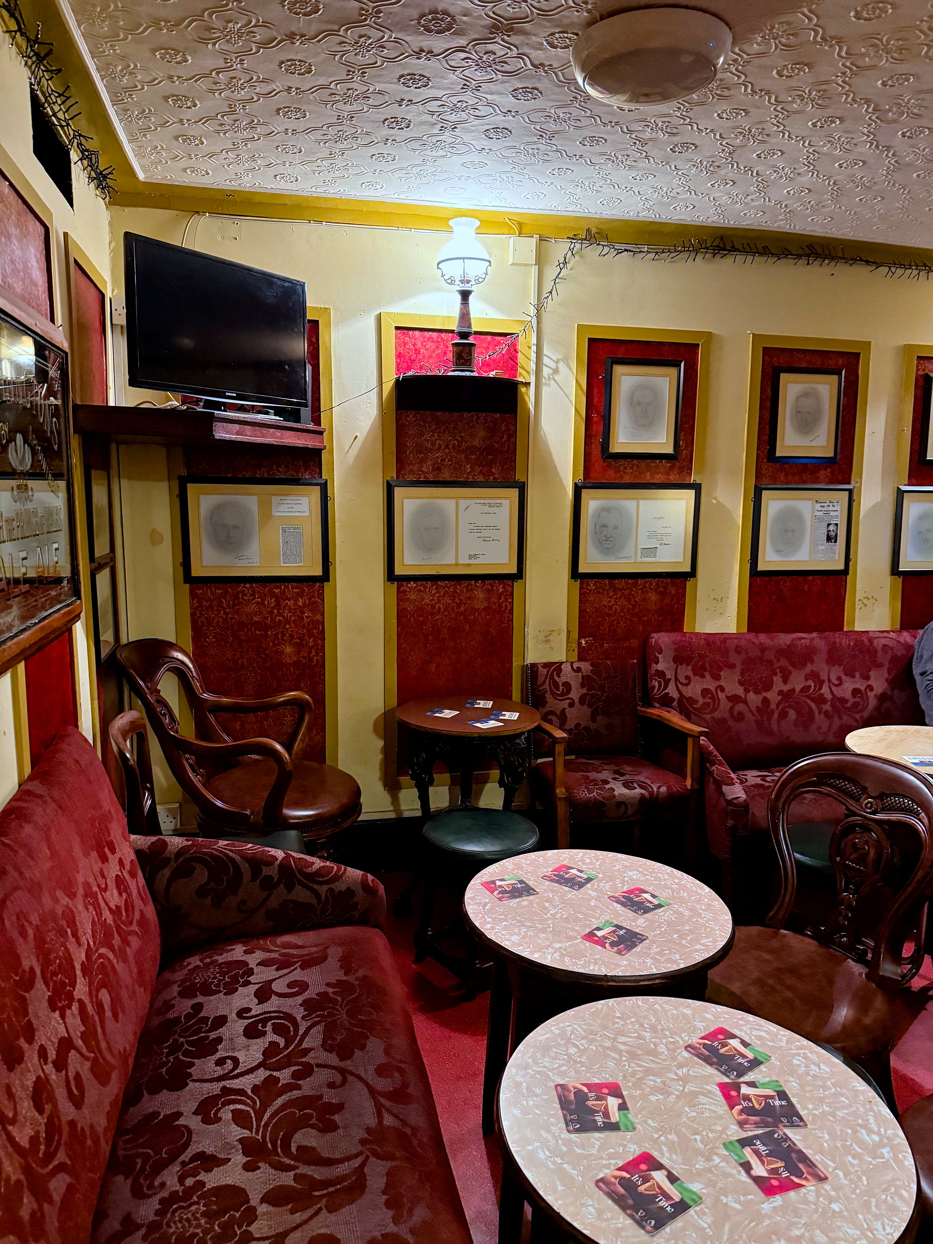Interior of The Hi-B Bar in Cork with portraits of famous people drawn by Brian O'Donnell