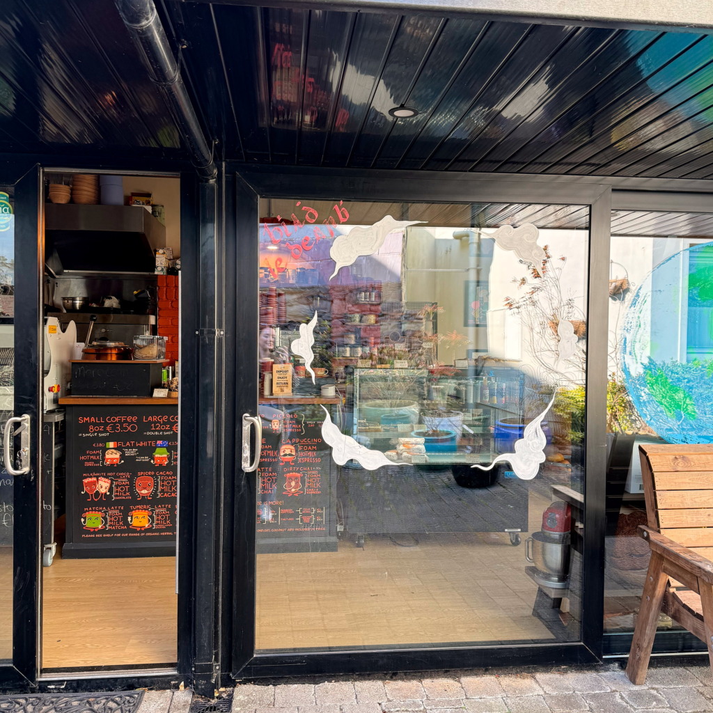 View of the outside of Nourish Cafe in Dingle, Ireland