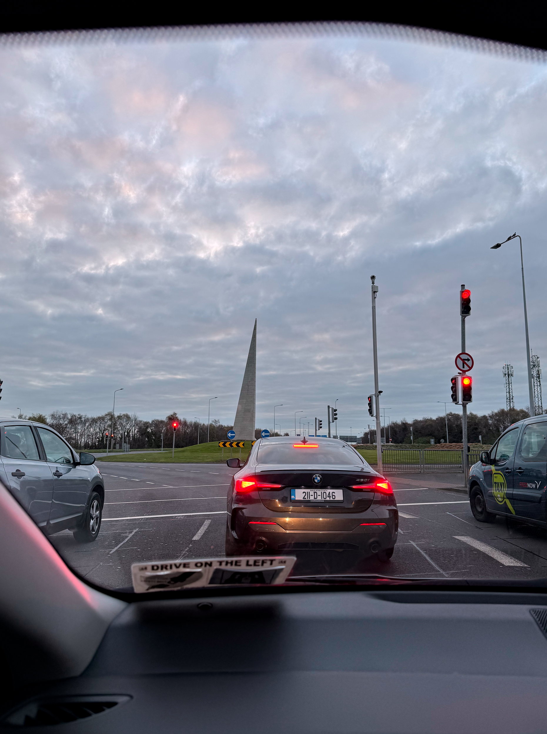 Cars waiting to enter a roundabout