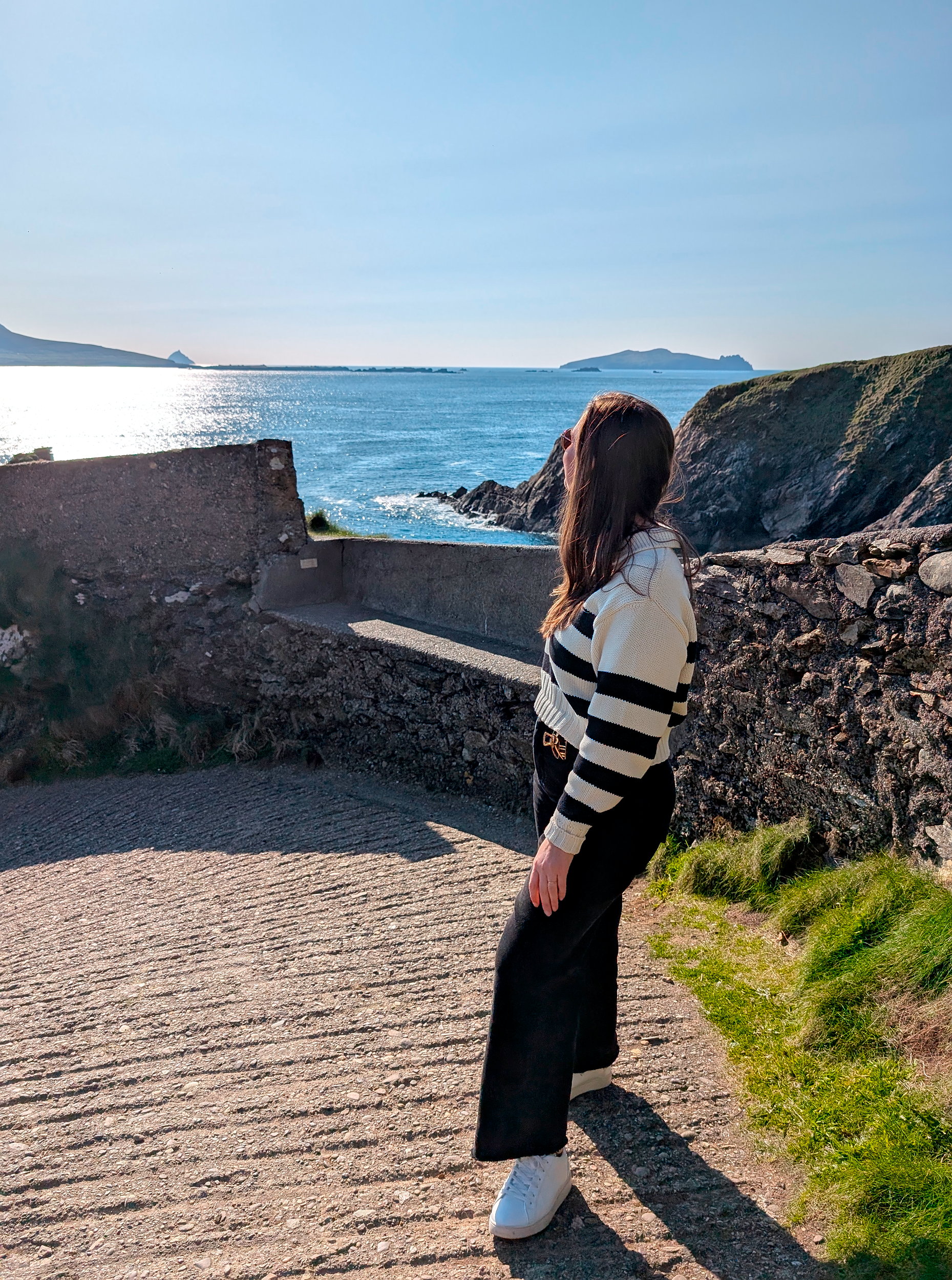 Alyssa looks out over Dunquin Pier in Dingle