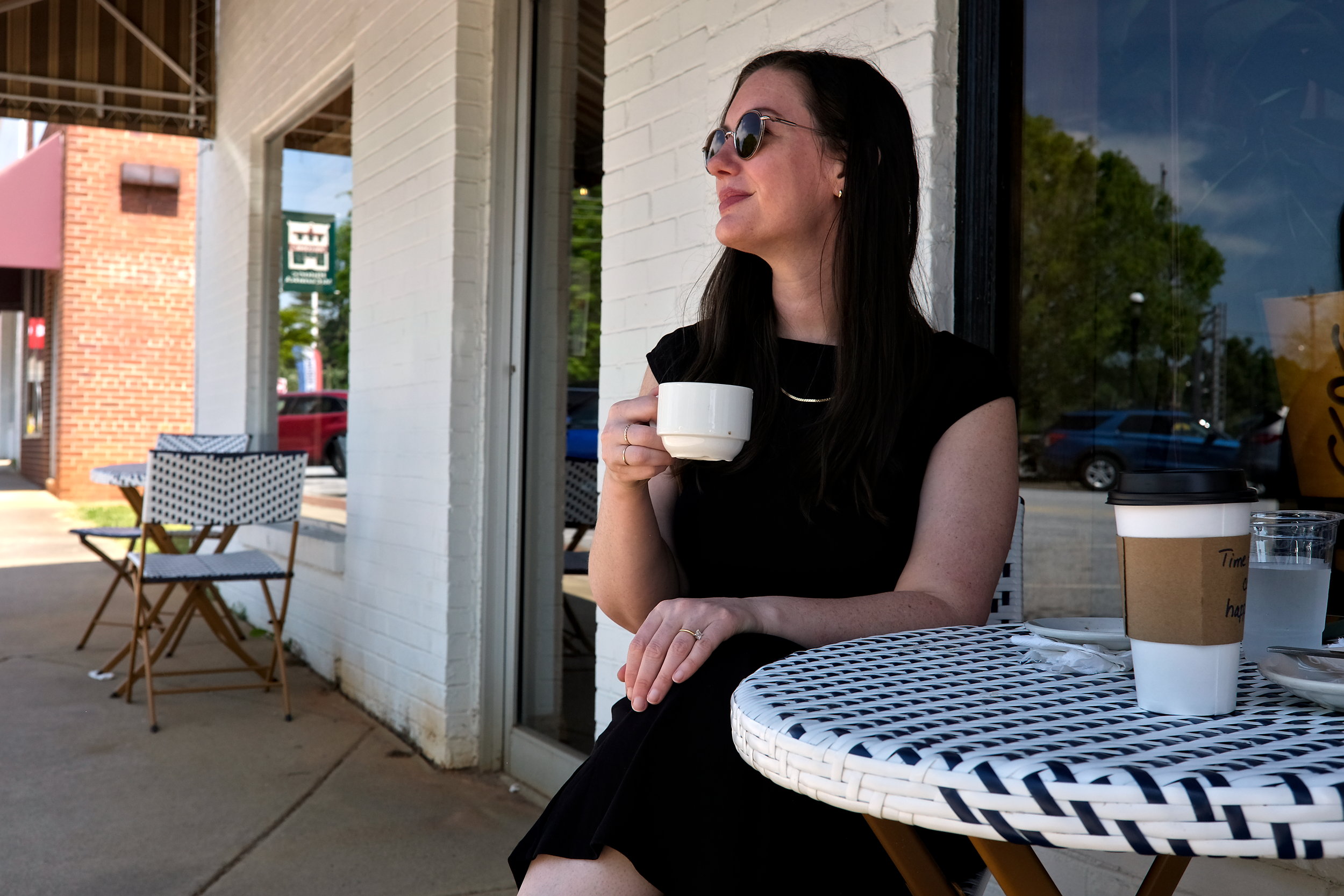 Alyssa sips an espresso at Main Street Coffee Company