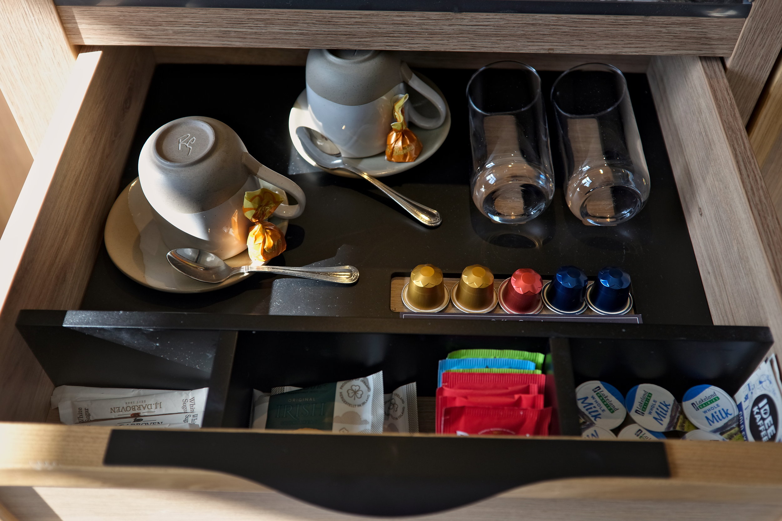 A selection of chocolates, teas, cookies, and coffee pods at Mespil Hotel