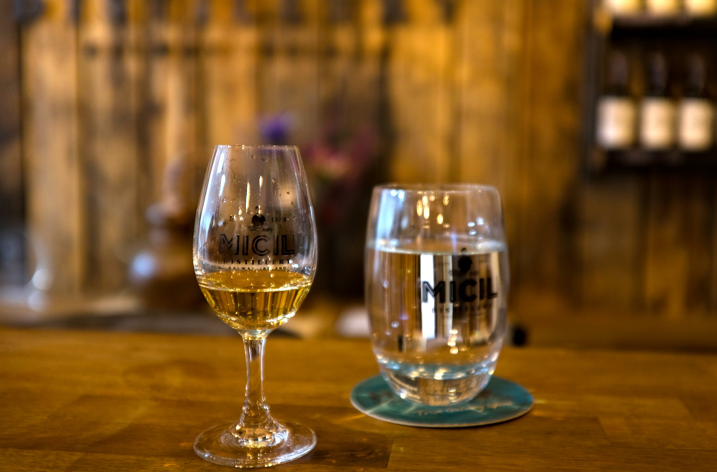 A tasting glass of whiskey at Micil Distillery