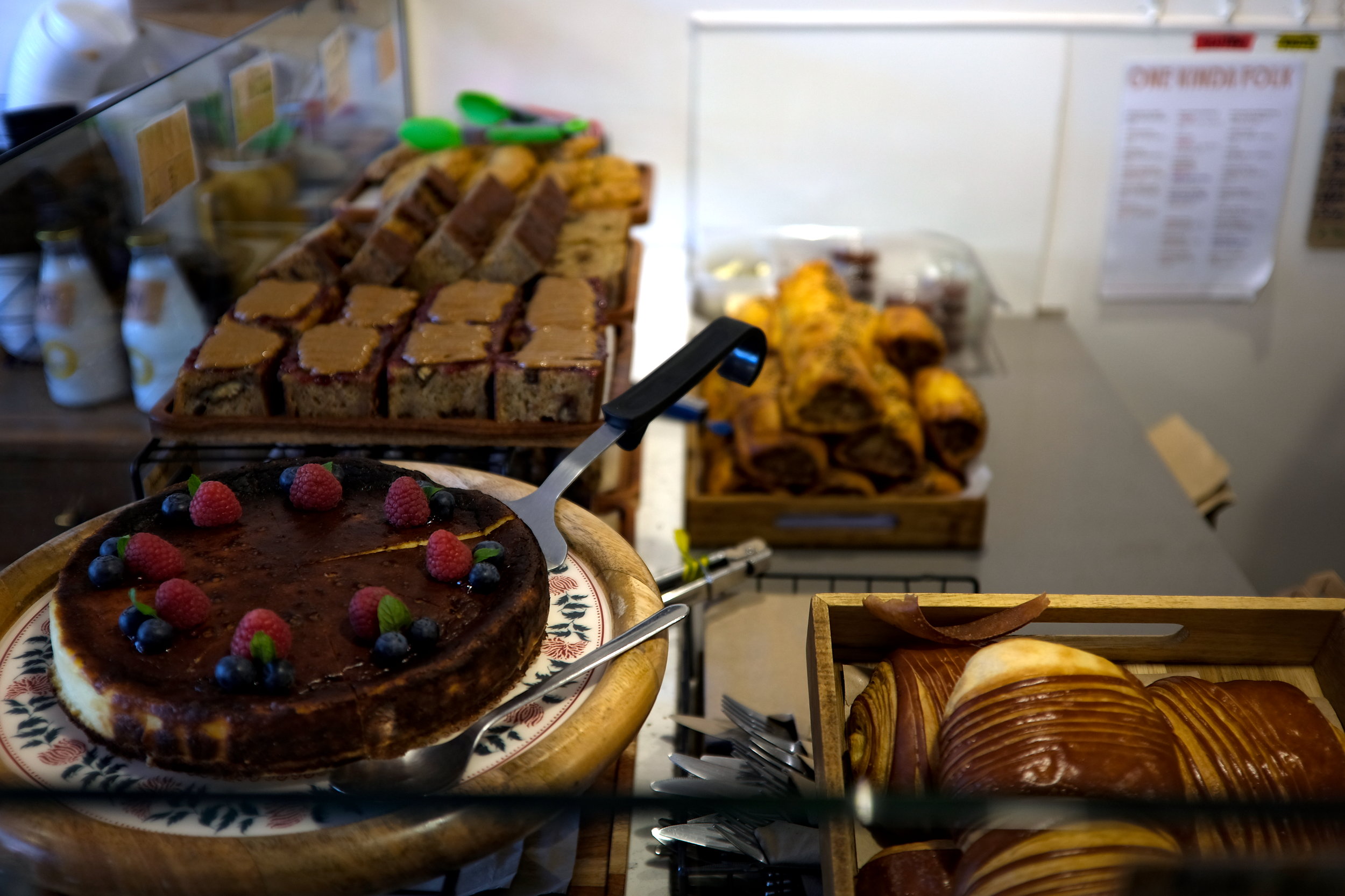 A tempting pastry case of goods at One Kinda Folk in Dublin, Ireland