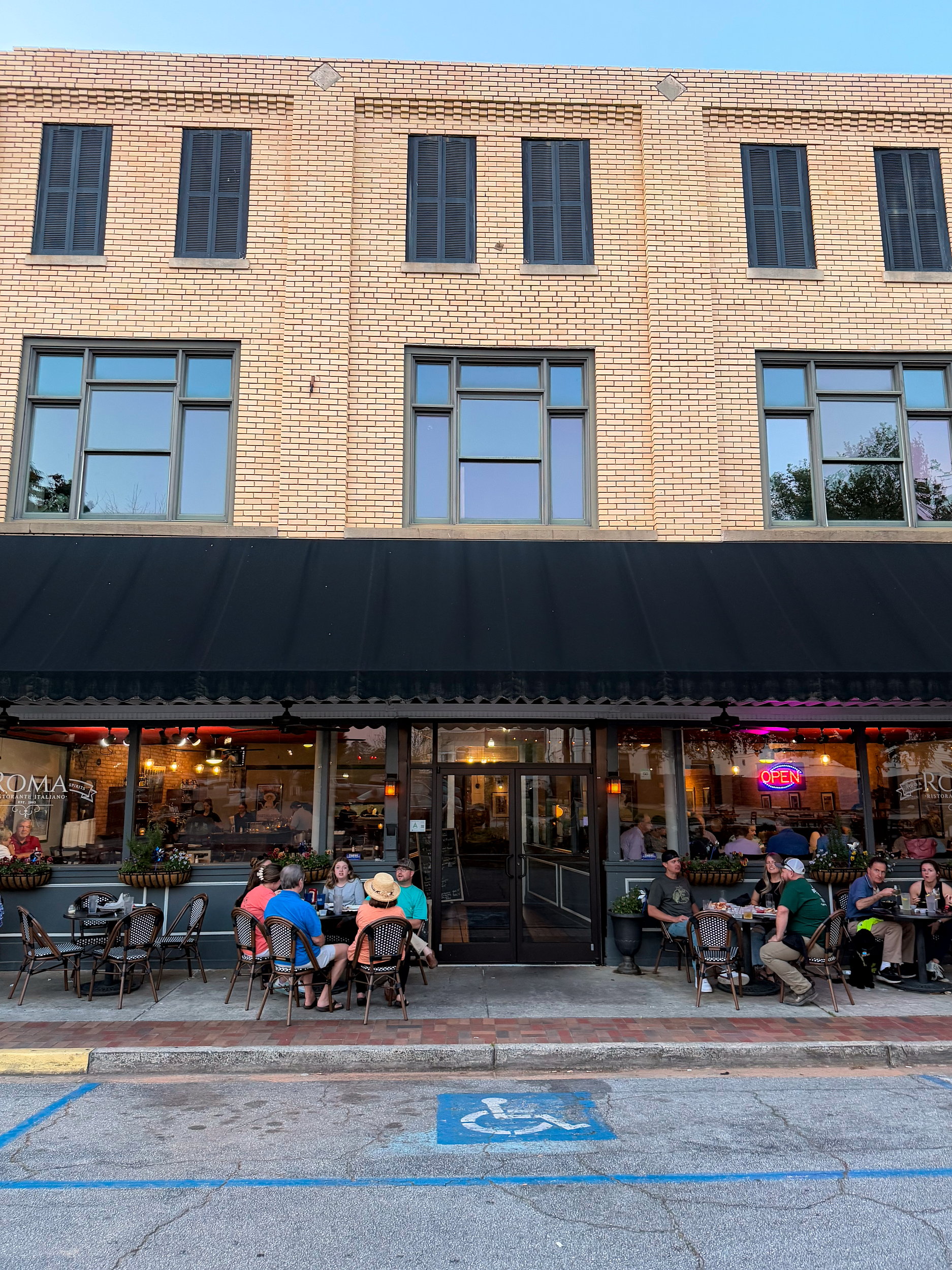 People dine on the patio at Roma in downtown Laurens, South Carolina