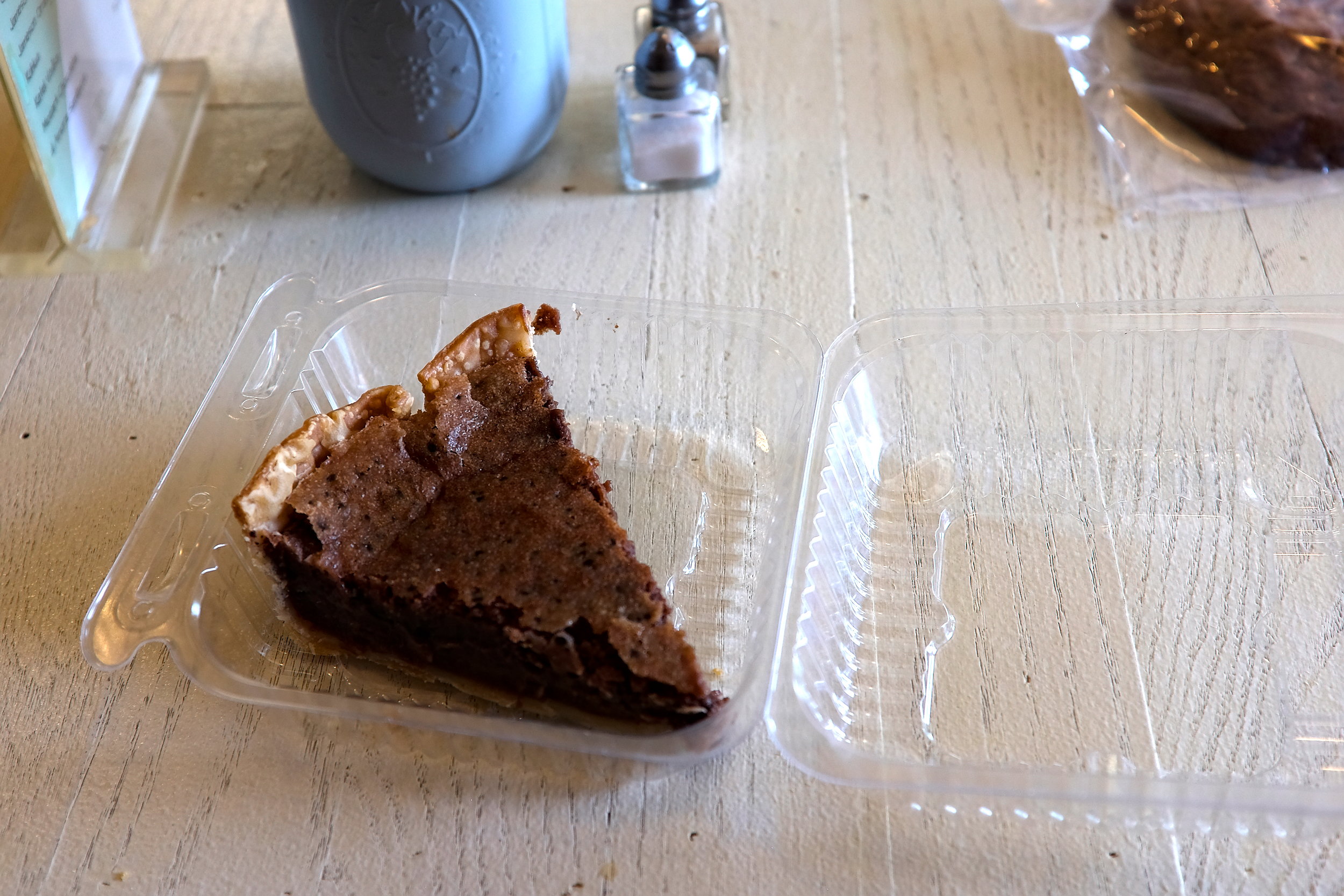 A slice of chocolate buttermilk pie on a table at TLC Confections