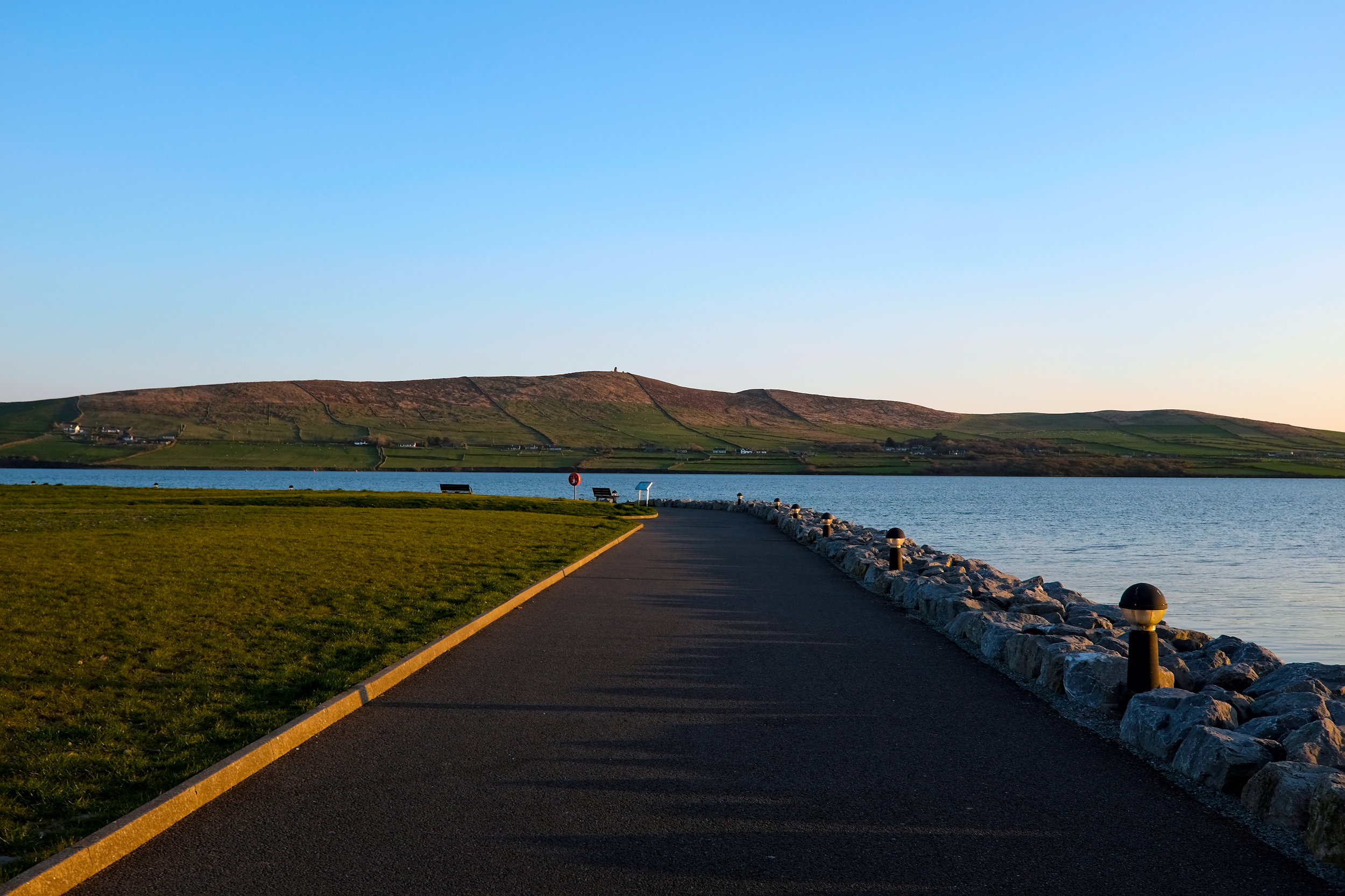 View of a walkway along the port in Dingle