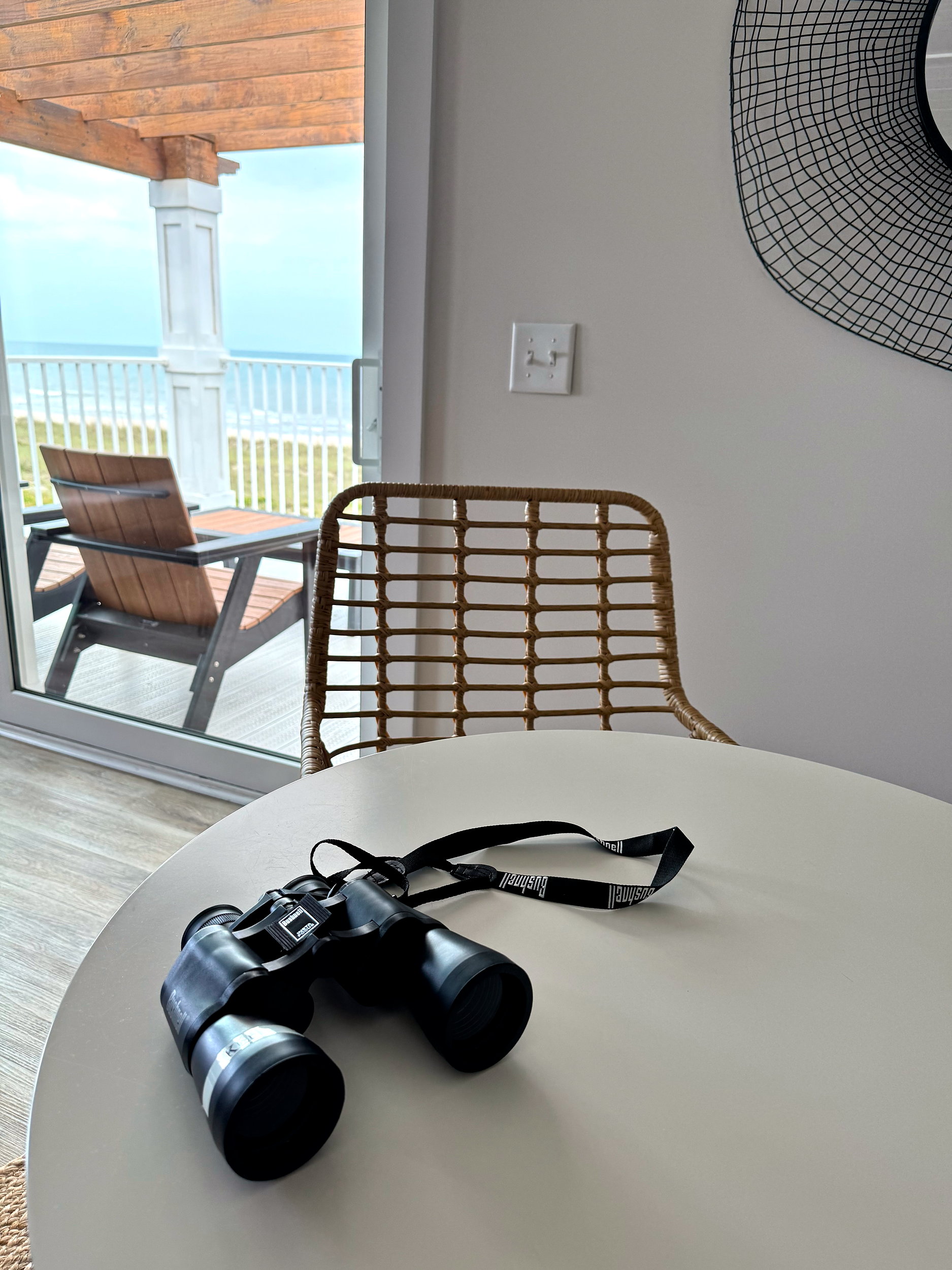 A pair of binoculars on a table at The Lighthouse