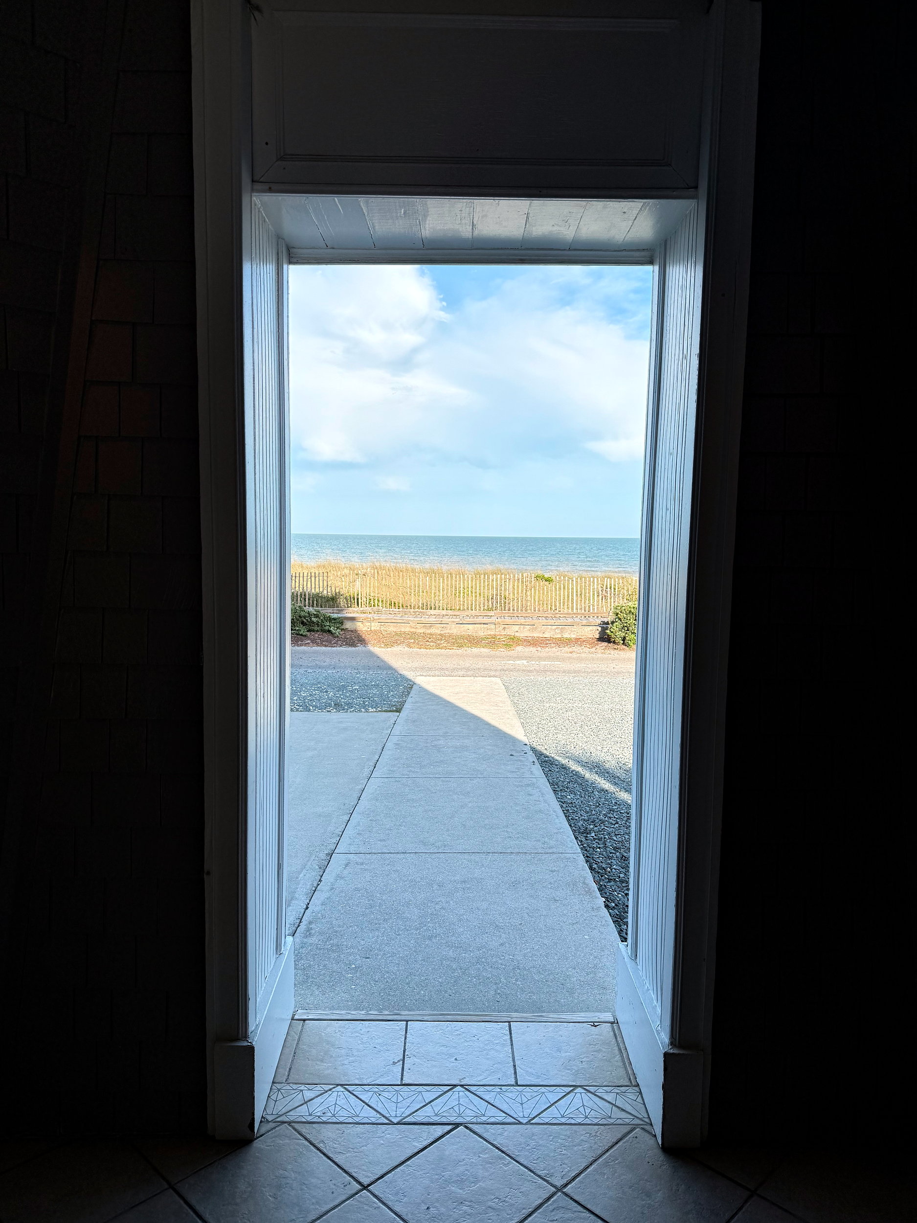 View of the walkway to the beach from The Lighthouse