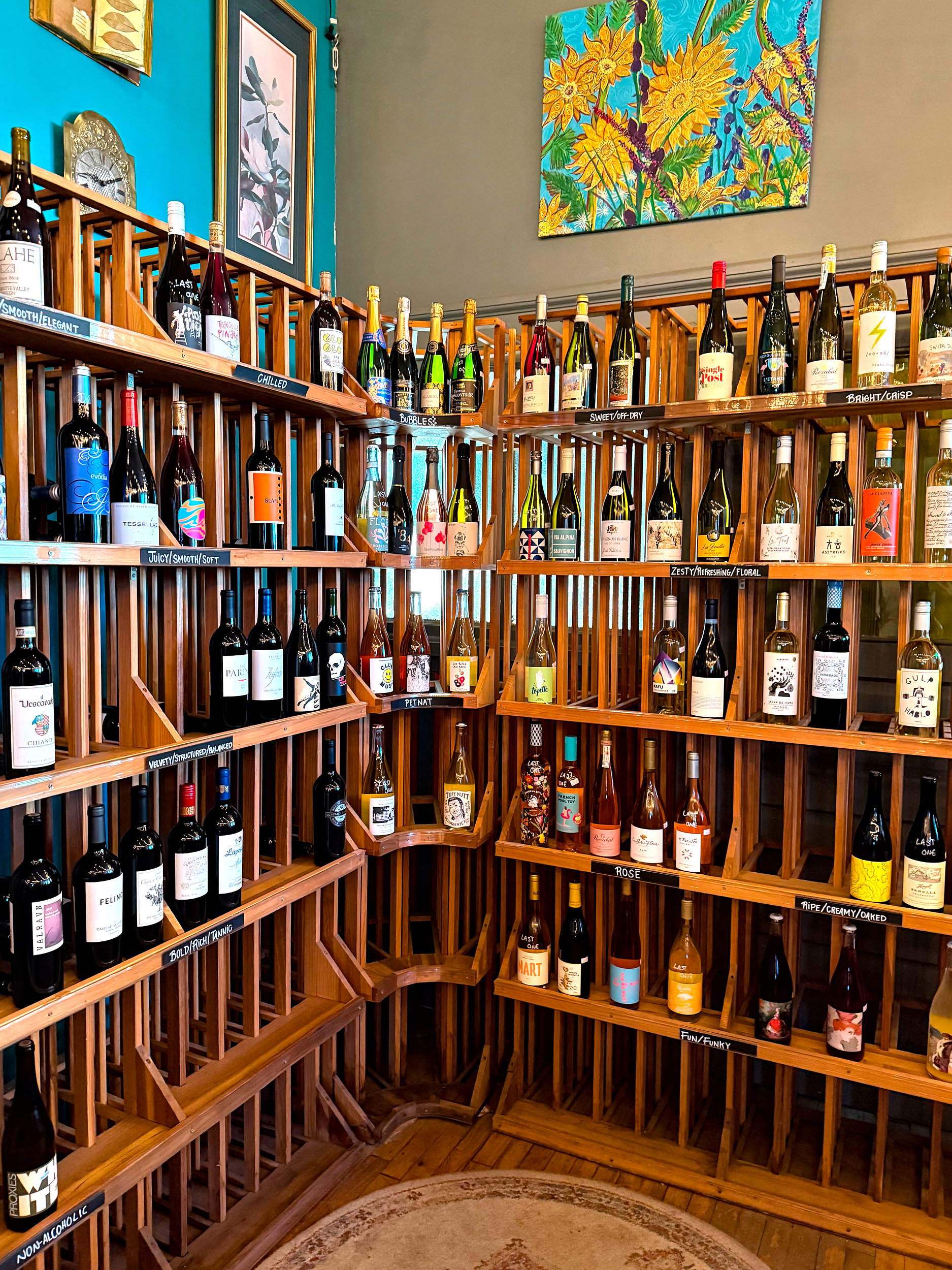 Bottles of wine on a shelf at Rosie's Coffee & Wine Garden